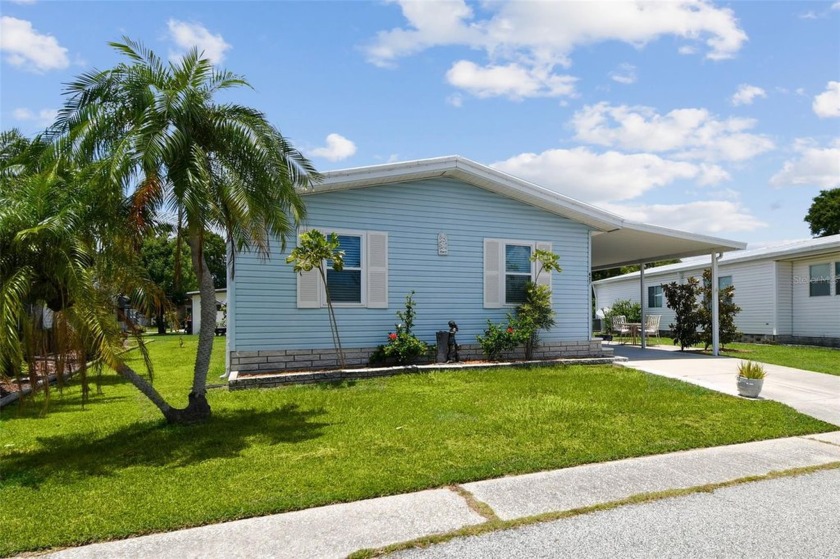 Beautifully Updated & Move-In Ready in Gull-Aire Village. This - Beach Home for sale in Oldsmar, Florida on Beachhouse.com