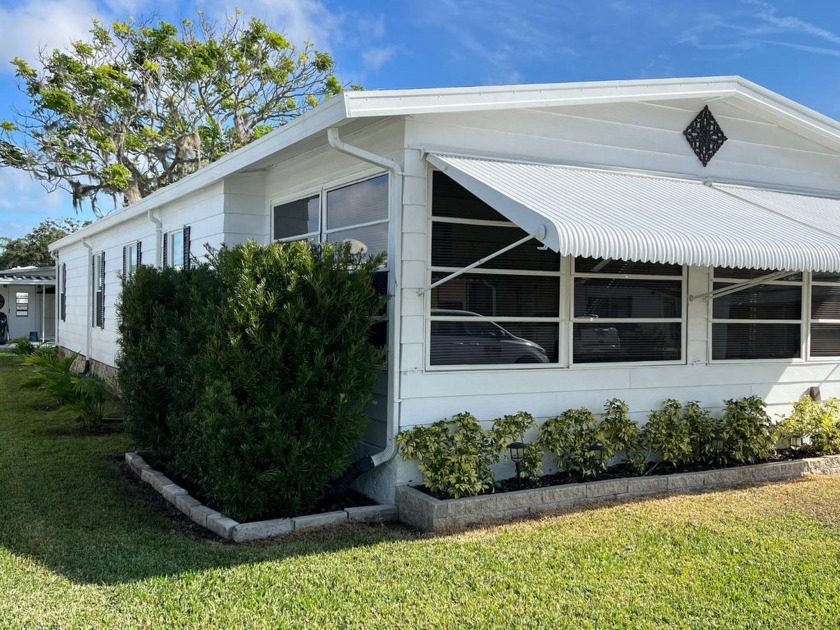 Looking for a 1,152 sq ft home with a big open floor plan? Then - Beach Home for sale in Holly Hill, Florida on Beachhouse.com