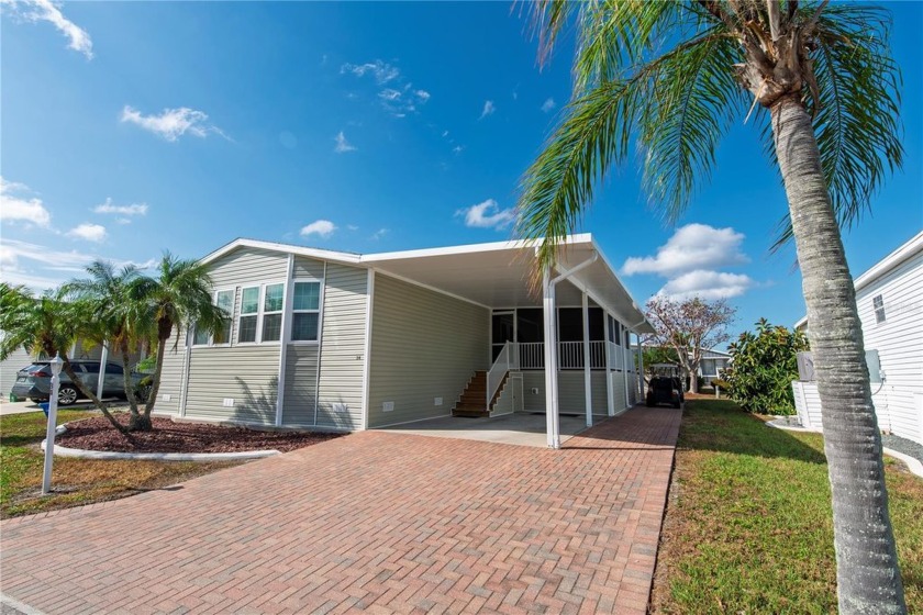 Located in the desirable 55+ community of Windmill Village, this - Beach Home for sale in Punta Gorda, Florida on Beachhouse.com