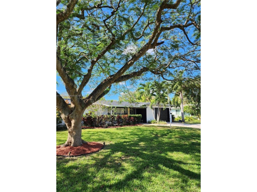 This stunning home features a newly designed kitchen with MARBLE - Beach Home for sale in Wilton Manors, Florida on Beachhouse.com