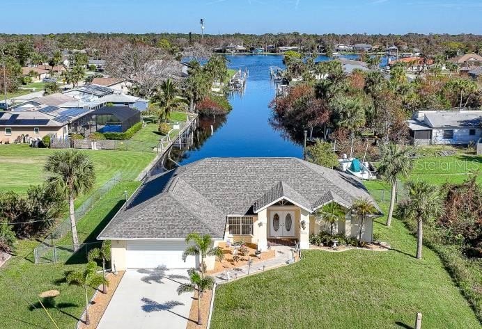 Perfectly situated at the end of a canal, this property offers - Beach Home for sale in Port Charlotte, Florida on Beachhouse.com