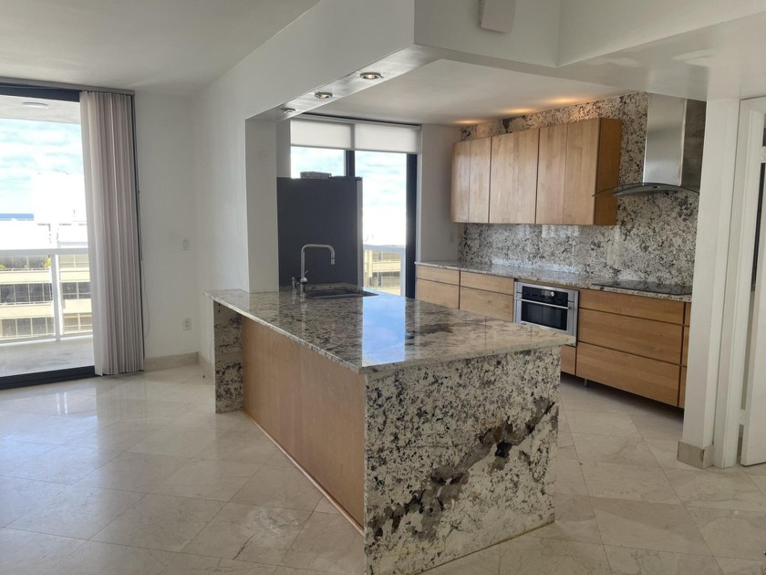 Beautiful marble floors and granite countertops throughout this - Beach Condo for sale in Miami Beach, Florida on Beachhouse.com