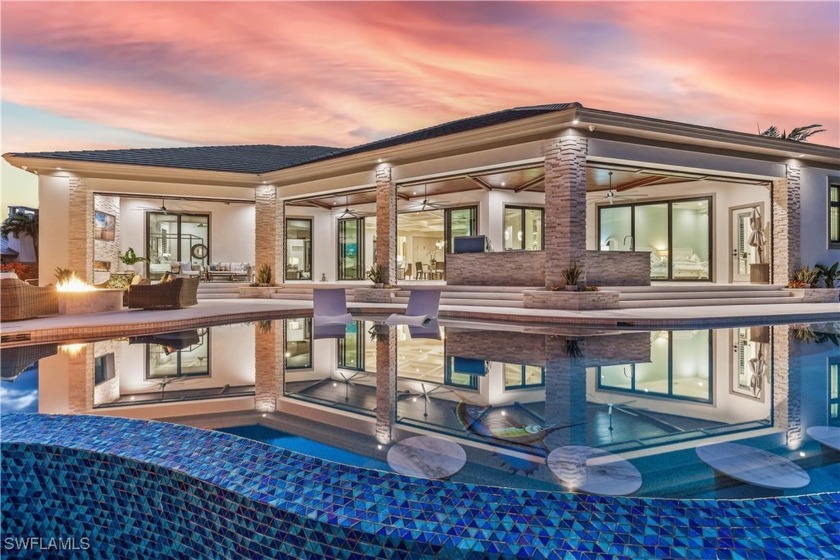 Discover unparalleled sophistication in this breathtaking new - Beach Home for sale in Cape Coral, Florida on Beachhouse.com