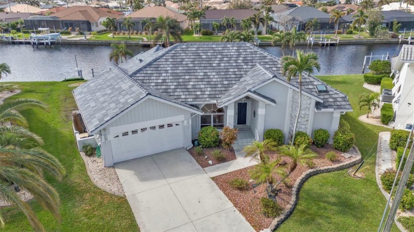 Escape to your own private oasis in this stunning waterfront - Beach Home for sale in Punta Gorda, Florida on Beachhouse.com