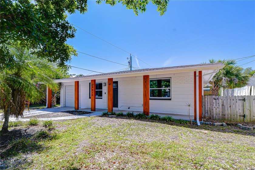 Enjoy coastal breezes from the front porch of this beautifully - Beach Home for sale in Gulfport, Florida on Beachhouse.com