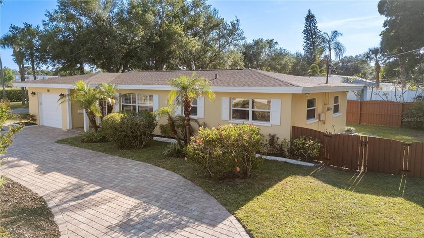 Perfectly positioned on a generous corner lot in one of the most - Beach Home for sale in Belleair Beach, Florida on Beachhouse.com