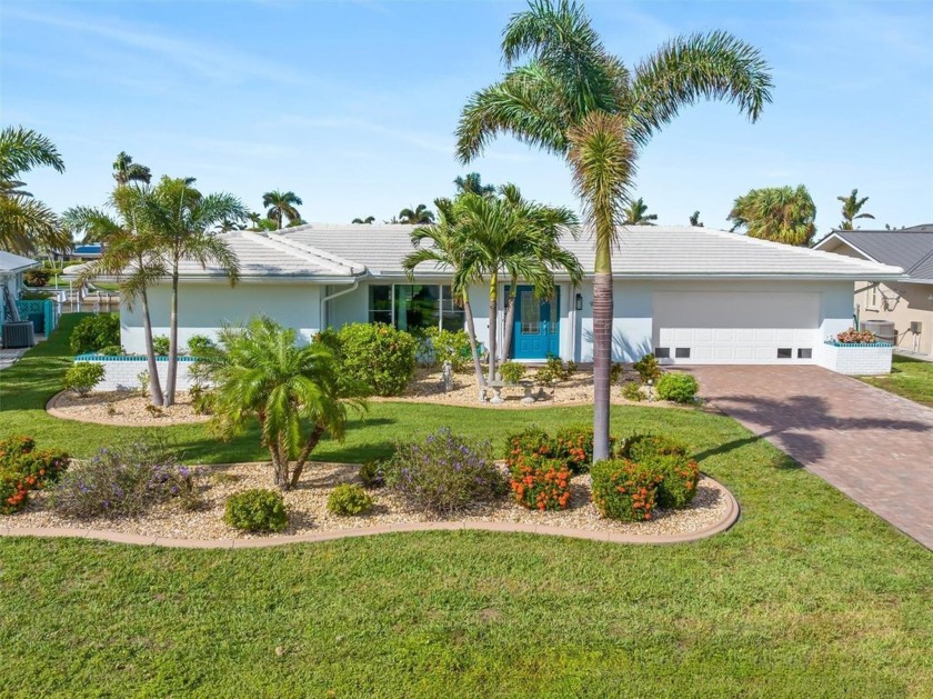 Step into this meticulously maintained waterfront home to - Beach Home for sale in Punta Gorda, Florida on Beachhouse.com