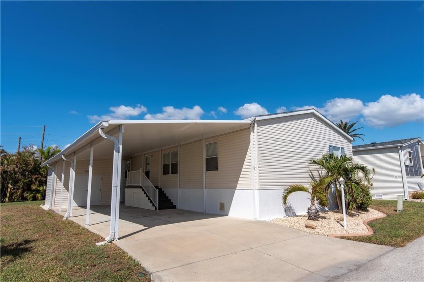 Welcome to the friendly neighborhood of Windmill Village a 55+ - Beach Home for sale in Punta Gorda, Florida on Beachhouse.com