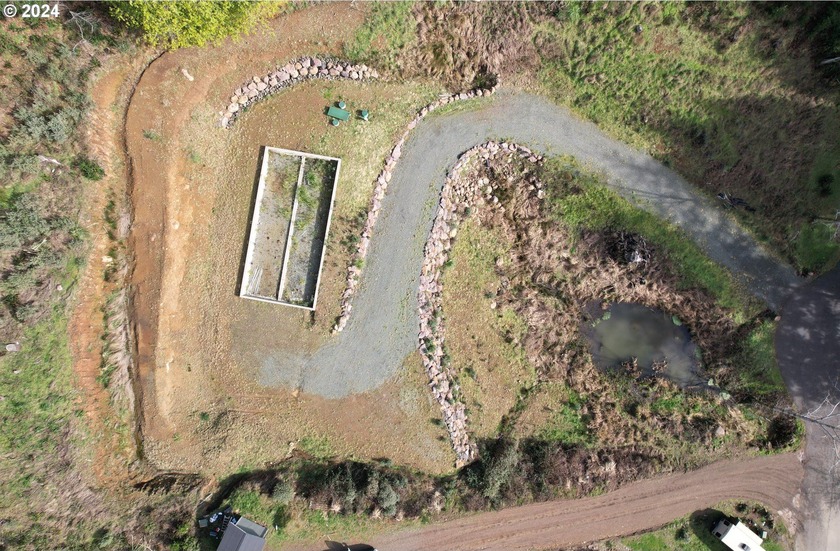 A coastal retreat. A breathtaking 1.57-acre property tucked away - Beach Lot for sale in Gold Beach, Oregon on Beachhouse.com