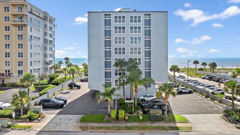 Gorgeous oceanfront condo in vibrant Jacksonville Beach. Wall of - Beach Condo for sale in Jacksonville Beach, Florida on Beachhouse.com