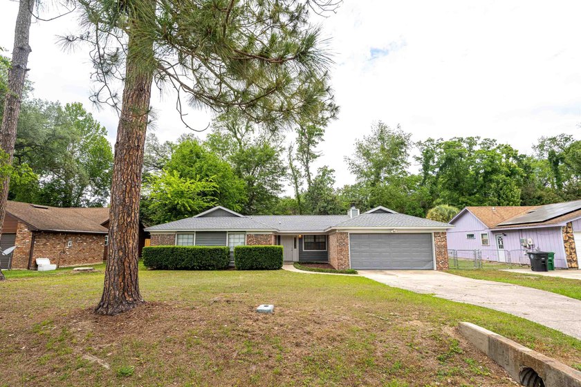 Nestled in a quiet, classic Tallahassee neighborhood, this - Beach Home for sale in Tallahassee, Florida on Beachhouse.com