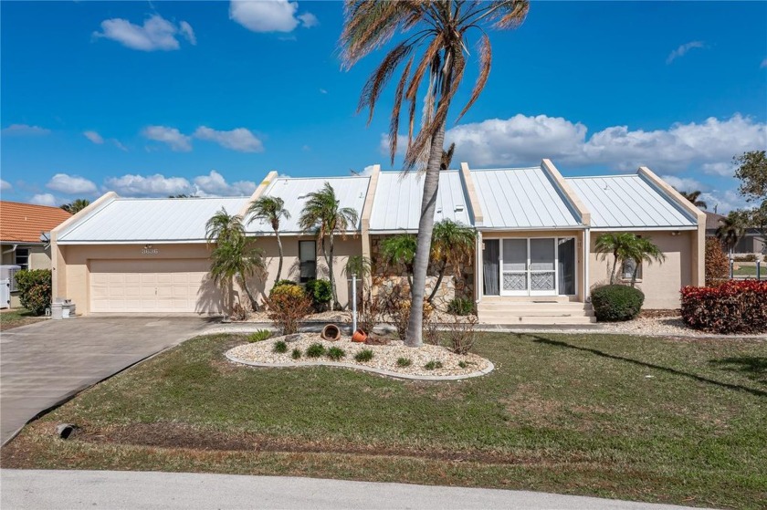 CALLING ALL BOATERS!!! PGI WATERFRONT HOME W/**NEW METAL ROOF** - Beach Home for sale in Punta Gorda, Florida on Beachhouse.com