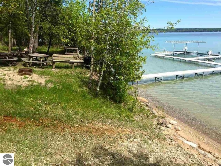 Torch Lake shared access compliments this spacious lot on quiet - Beach Lot for sale in Kewadin, Michigan on Beachhouse.com