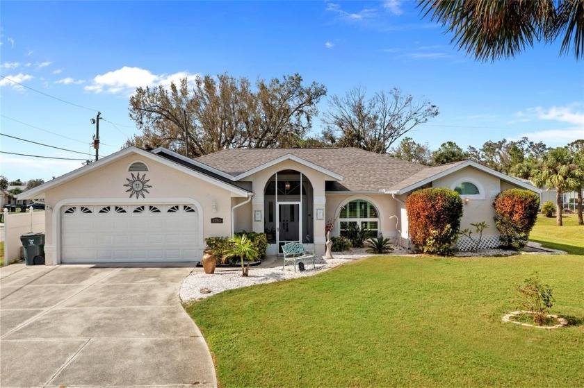 Exceptional 3-bedroom, 2-bath, 2-car garage pool home nestled on - Beach Home for sale in North Port, Florida on Beachhouse.com