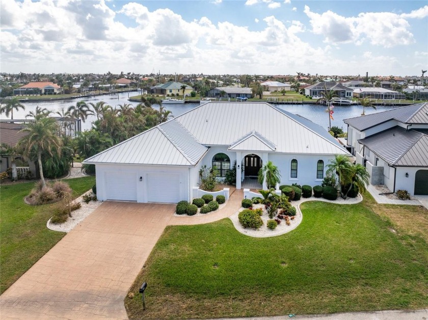 Stunning custom WATERFRONT pool home located on JAMAICA WAY the - Beach Home for sale in Punta Gorda, Florida on Beachhouse.com