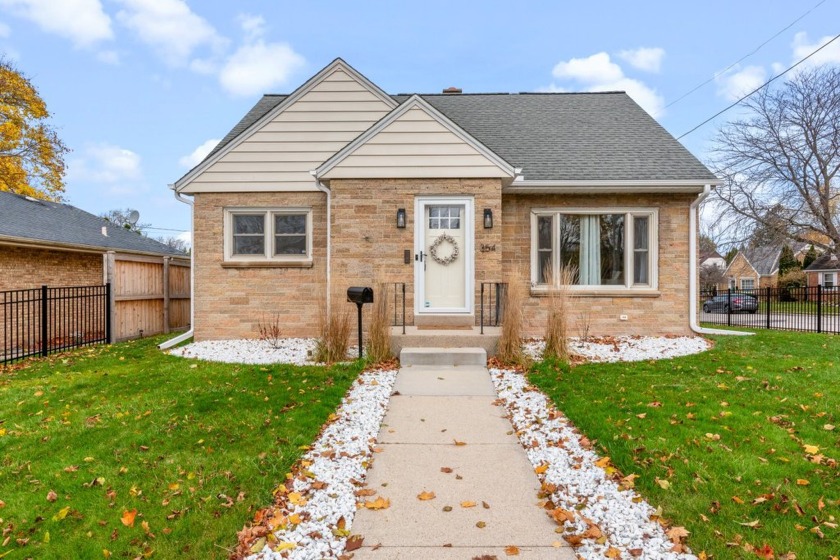 This cape cod cutie will wow you from the moment you pull up in - Beach Home for sale in Port Washington, Wisconsin on Beachhouse.com