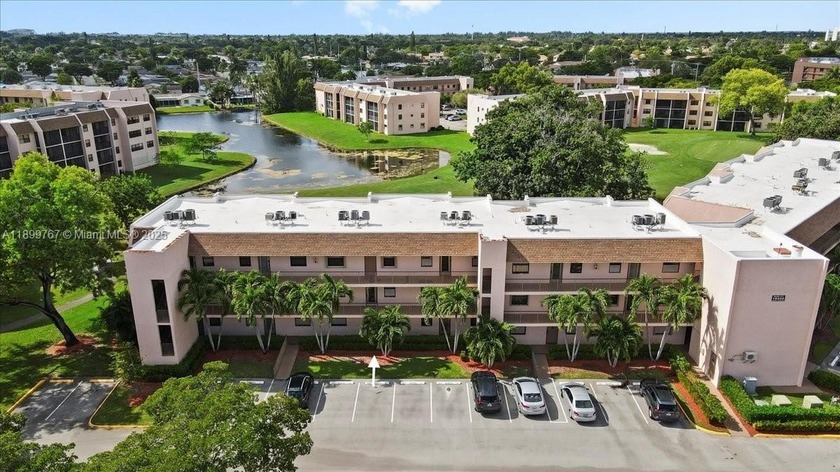 Beautiful and bright first-floor condo featuring 2 bedrooms and - Beach Condo for sale in Sunrise, Florida on Beachhouse.com