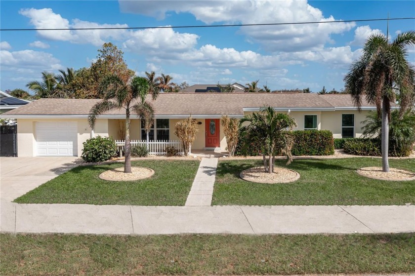 WATERFRONT HOME IN PORT CHARLOTTE W/100 FT OF SEAWALL, LARGE - Beach Home for sale in Port Charlotte, Florida on Beachhouse.com