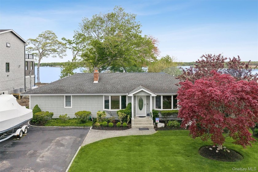 Set along the Forge River with direct access to Moriches Bay and - Beach Home for sale in Moriches, New York on Beachhouse.com