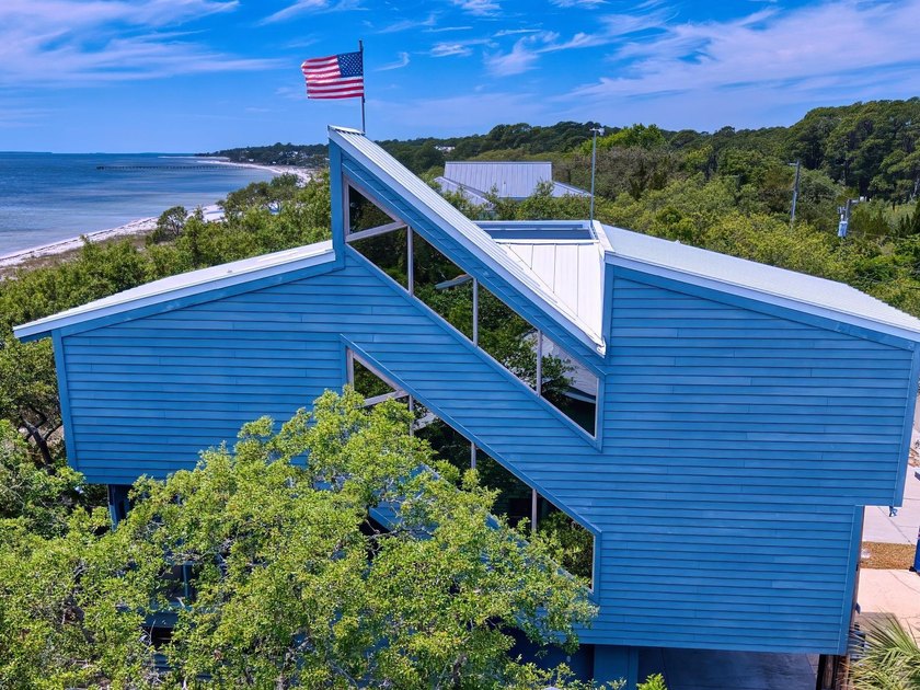 Tucked beneath a canopy of majestic oak trees that provide - Beach Home for sale in Sopchoppy, Florida on Beachhouse.com