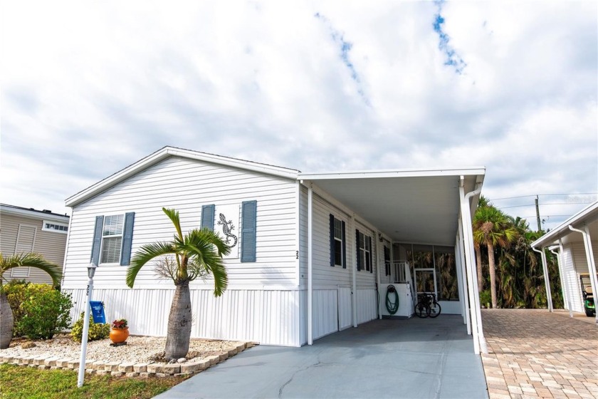 This charming turnkey, 2007 Nobility Homes model offers 1,056 - Beach Home for sale in Punta Gorda, Florida on Beachhouse.com