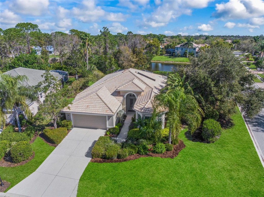 Fabulous residence set on a sparkling lake for scenic views - Beach Home for sale in Osprey, Florida on Beachhouse.com