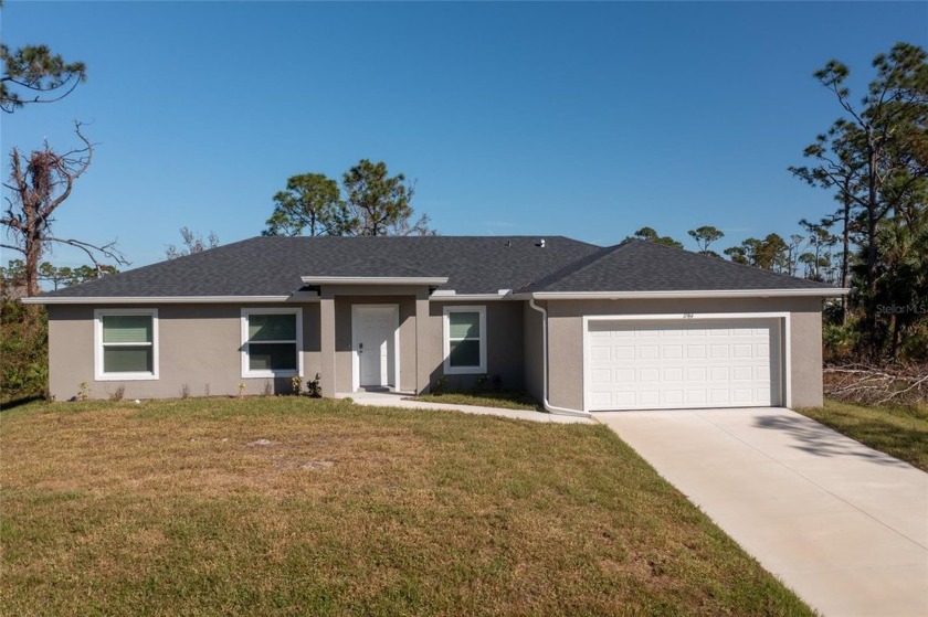 NEW CONSTRUCTION! MOVE-IN-READY! GREAT INVESTMENT OPPORTUNITY OR - Beach Home for sale in Port Charlotte, Florida on Beachhouse.com