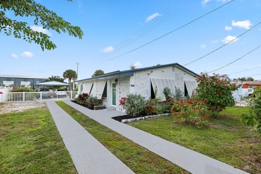 Upscale WATERFRONT home with mid-century flair in the hidden gem - Beach Home for sale in Dania, Florida on Beachhouse.com