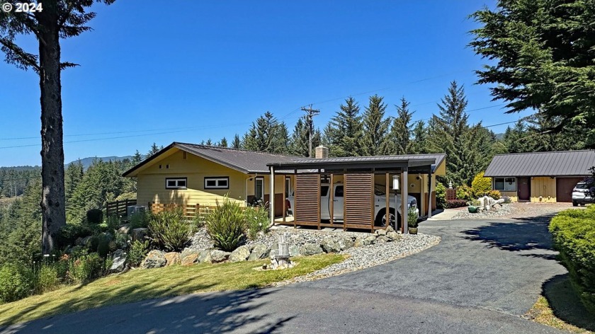 A METICULOUSLY DESIGNED HOME that exudes a perfect blend of - Beach Home for sale in Brookings, Oregon on Beachhouse.com