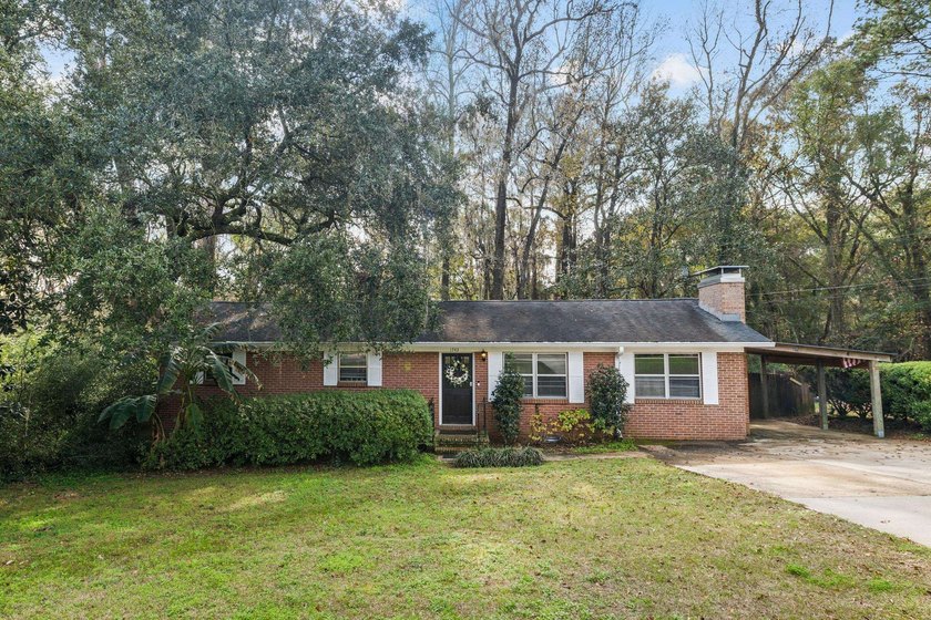 Welcome home to this beautifully updated brick residence - Beach Home for sale in Tallahassee, Florida on Beachhouse.com