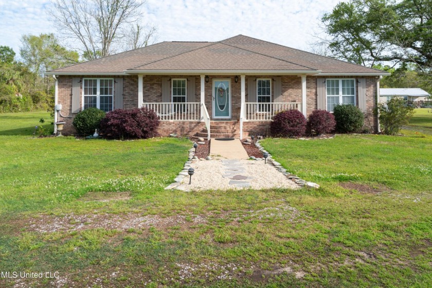 This could be your serene waterfront life! Live comfortably in - Beach Home for sale in Pass Christian, Mississippi on Beachhouse.com