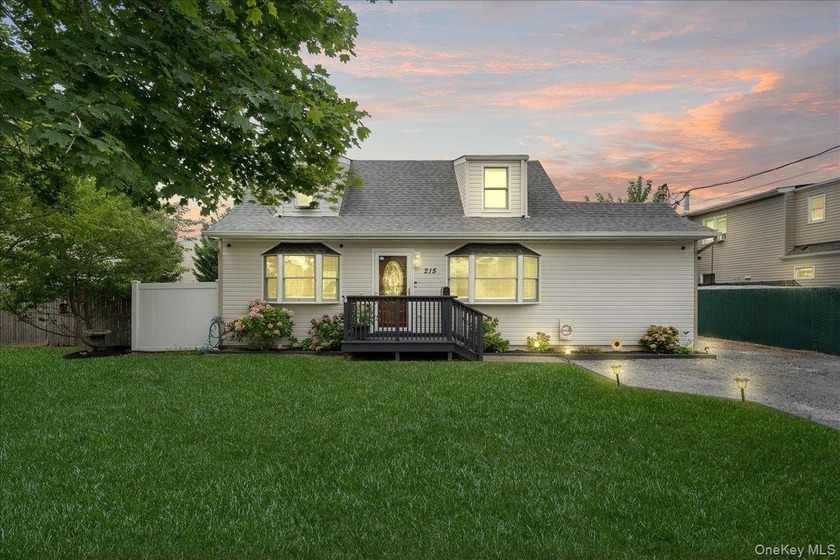 Move-In Ready 3-Bedroom Cape in Copiague! Welcome to this - Beach Home for sale in Copiague, New York on Beachhouse.com