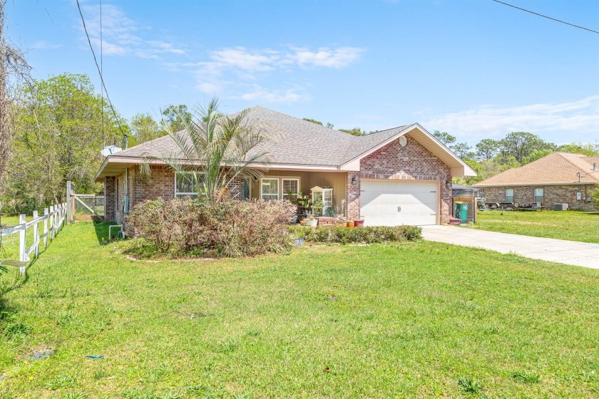 Enjoy the country setting of this contemporary home right in the - Beach Home for sale in Fort Walton Beach, Florida on Beachhouse.com