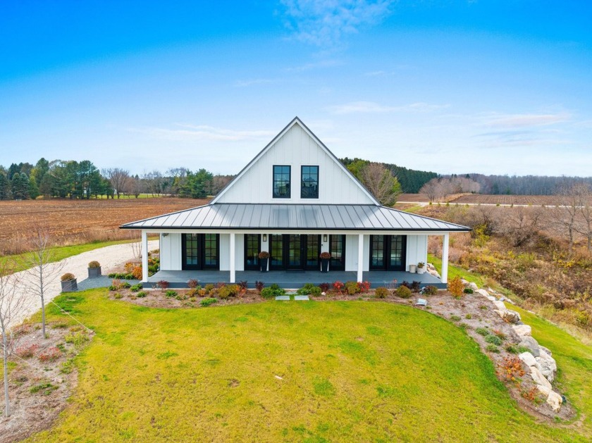 Discover luxury and serenity in this stunning new custom-built - Beach Home for sale in Manitowoc, Wisconsin on Beachhouse.com