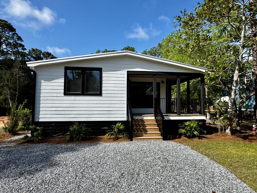Fresh, coastal, and perfectly placed, this brand-new Point - Beach Home for sale in Santa Rosa Beach, Florida on Beachhouse.com