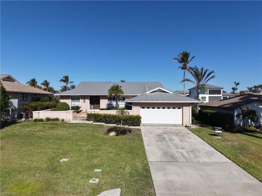 Discover coastal living at its finest in this exquisite home - Beach Home for sale in Naples, Florida on Beachhouse.com