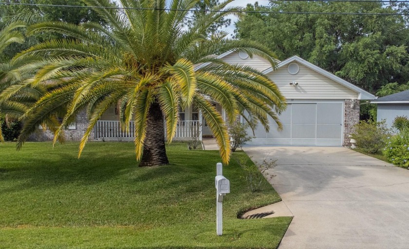 This charming and well-maintained home built by Adams Homes in - Beach Home for sale in Palm Coast, Florida on Beachhouse.com