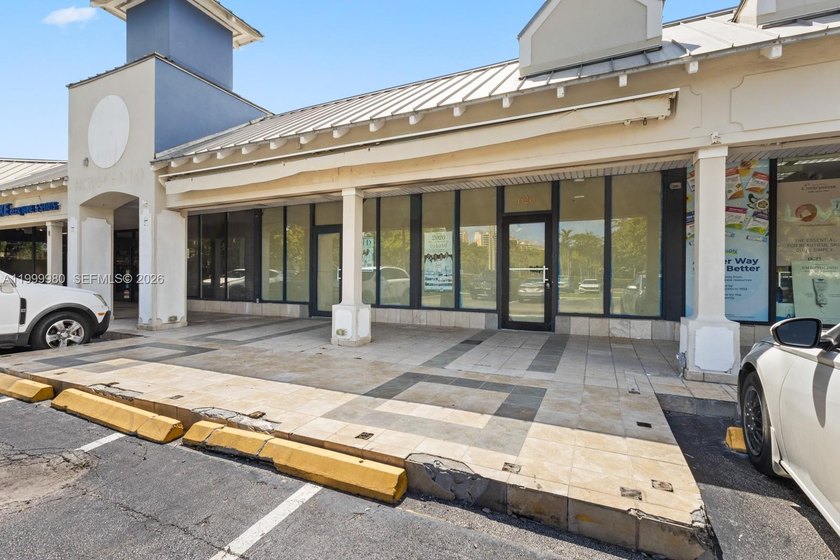 Located in a well-established, high-traffic strip center in the - Beach Commercial for sale in Key Biscayne, Florida on Beachhouse.com