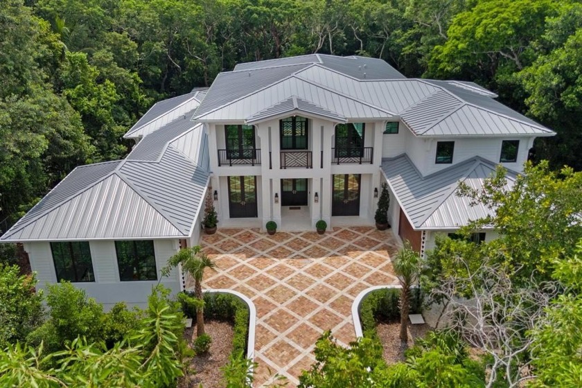 Coastal Elegance Meets Modern Luxury.  New Construction - Beach Home for sale in Key Largo, Florida on Beachhouse.com