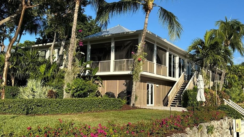 Set within the private gates of the Key Largo Anglers Club, this - Beach Condo for sale in Key Largo, Florida on Beachhouse.com