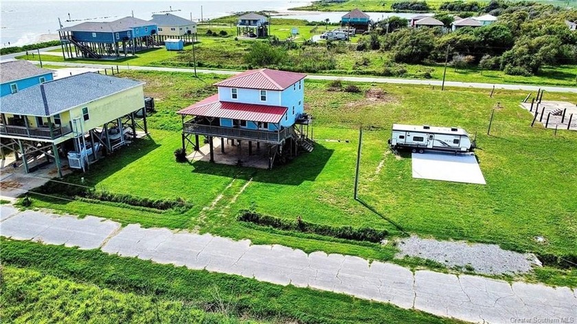 Embrace coastal living with this charming Rustic Beach Cottage - Beach Home for sale in Cameron, Louisiana on Beachhouse.com
