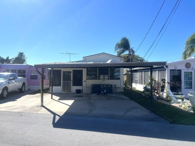 Beach Home For Sale in Holiday, Florida