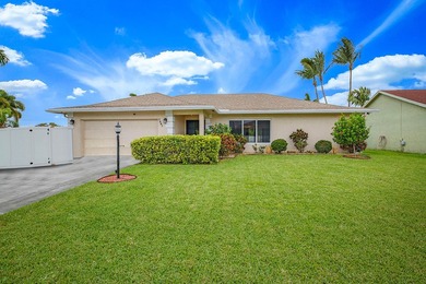 Beach Home For Sale in Lake Clarke Shores, Florida