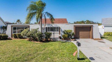Beach Home For Sale in Holiday, Florida