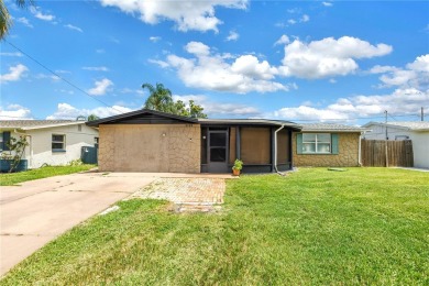 Beach Home For Sale in Holiday, Florida