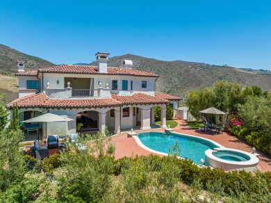 This custom Spanish-style estate is an amenity-laden paradise - Beach Home for sale in Malibu, California on Beachhouse.com