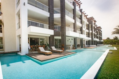 Condo For Sale in Playa Del Carmen image photo picture