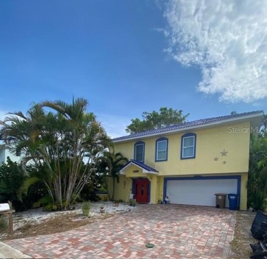 Beach Home For Sale in Madeira Beach, Florida