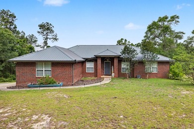 Beach Home For Sale in Baker, Florida