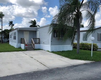 Beach Home For Sale in Lake Worth, Florida